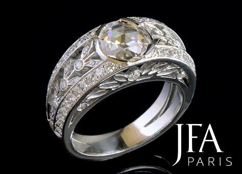 Belle bague en platine sertie en son centre d´un diamant taillé en rose et d´un entourage de diamants.

Nous attirons votre attention sur la qualité des découpes du feuillage serti de diamants et du profil de cette bague également serti de trois diamants.

La fabrication de cette bague a nécessité l´intervention de quatre artisans spécialisés : le dessinateur, le joaillier, le sertisseur et la polisseuse.